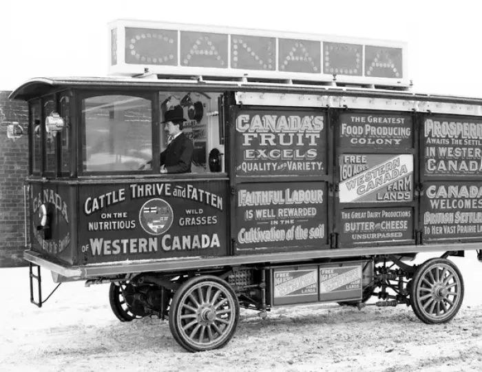 Framed Print : Advertising on a bus for Immigration to Canada Framed Print : Advertising on a bus for Immigration to Canada