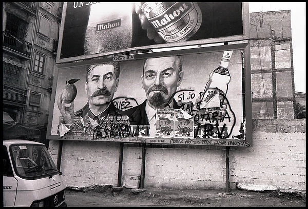 Advertising hoarding with grafitti, Valencia, Spain