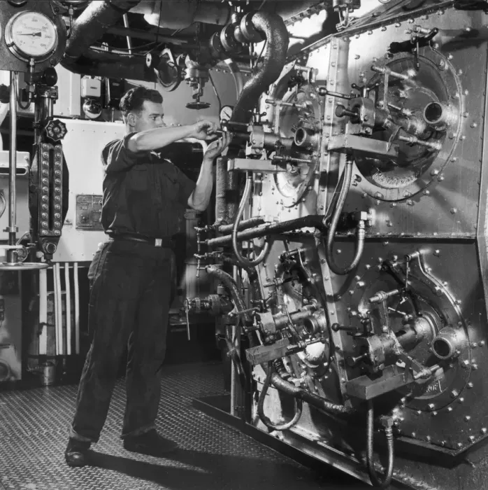 Framed Print : Adjusting a valve in a submarine Framed Print : Adjusting a valve in a submarine