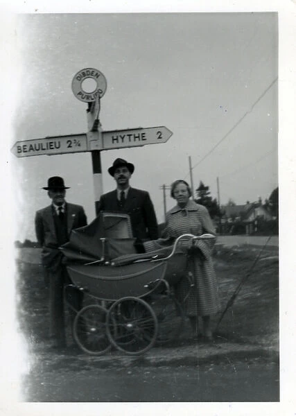 Adults With Vintage Pram at Road Sign, Dibden Purlieu, Hamps