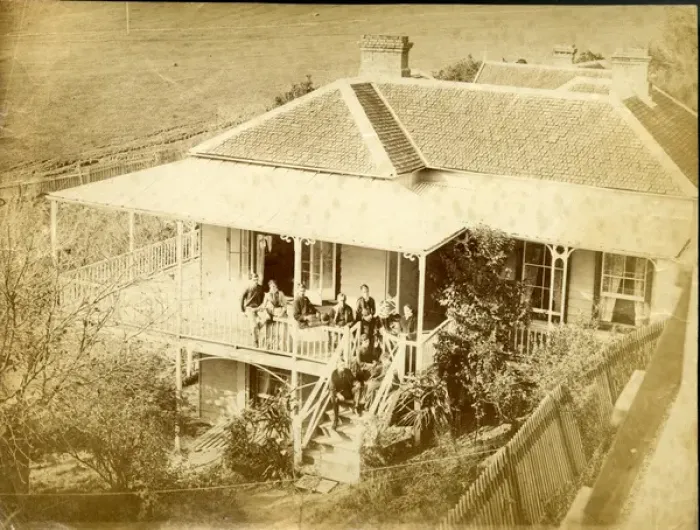 Framed Print : Aerial photograph of house with group of people Framed Print : Aerial photograph of house with group of people