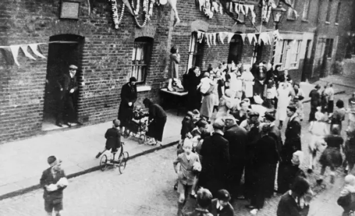 Framed Print : Aerial view, people at a street party with bunting Framed Print : Aerial view, people at a street party with bunting