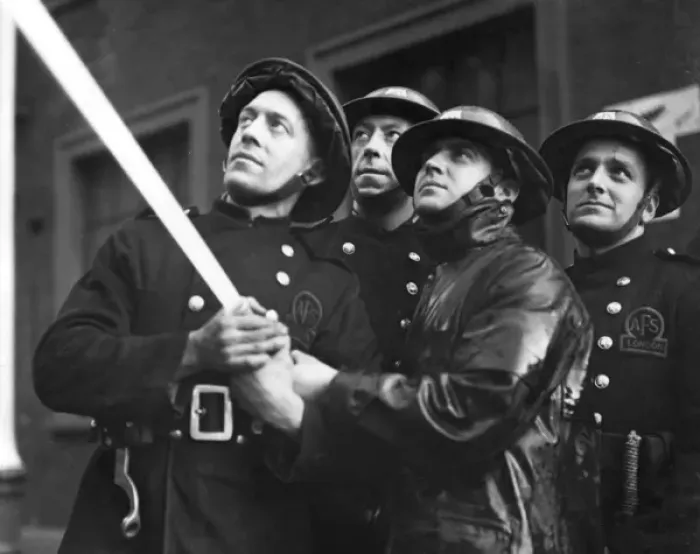 Framed Print : Four AFS firefighters operating hosepipe, WW2 Framed Print : Four AFS firefighters operating hosepipe, WW2