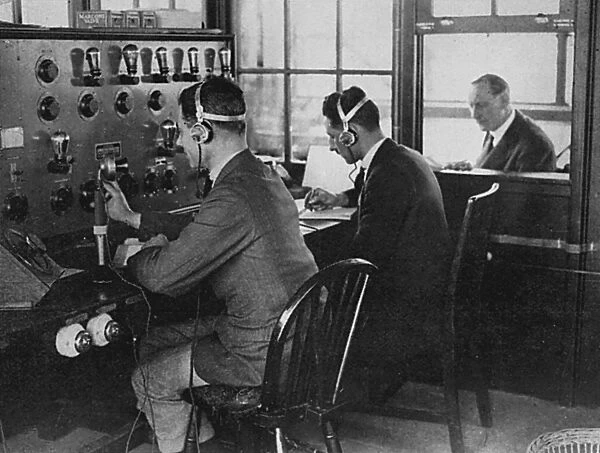 Air Traffic Controllers in the control tower at Croydon Airport are in