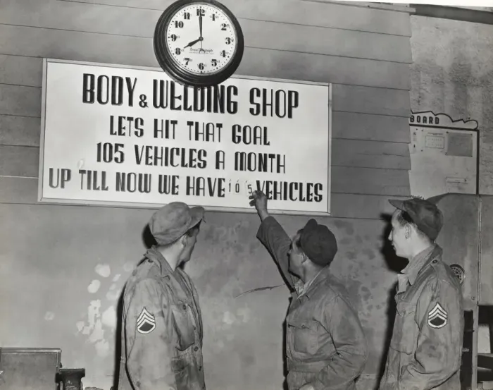 Framed Print : Three Airmen at the Goal Accomplished Sign in the Body? Framed Print : Three Airmen at the Goal Accomplished Sign in the Body?