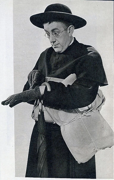 Alec Guinness (1914 - 2000) portraying G. K. Chesterton's sleuth Father Brown in the 1954 film of the same name. In the United States the film was marketed under the title 'The Detective'. Date: 1954