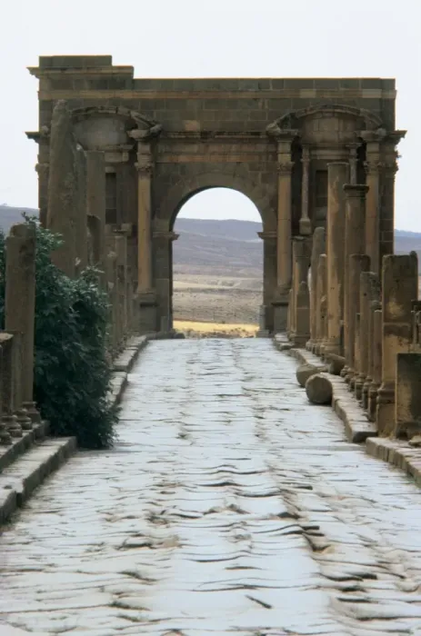 Framed Print : Algeria. Timgad. Roman causeway and Trajans Arch Framed Print : Algeria. Timgad. Roman causeway and Trajans Arch