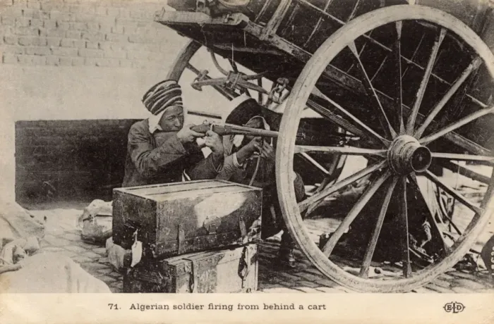 Framed Print : Two Algerian soldiers firing from behind the cover of a cart Framed Print : Two Algerian soldiers firing from behind the cover of a cart
