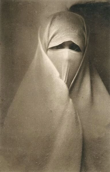 Algerian woman behind the veil
