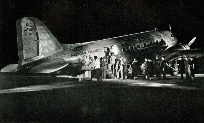 Framed Print : American Airlines passengers boarding a night flight Framed Print : American Airlines passengers boarding a night flight