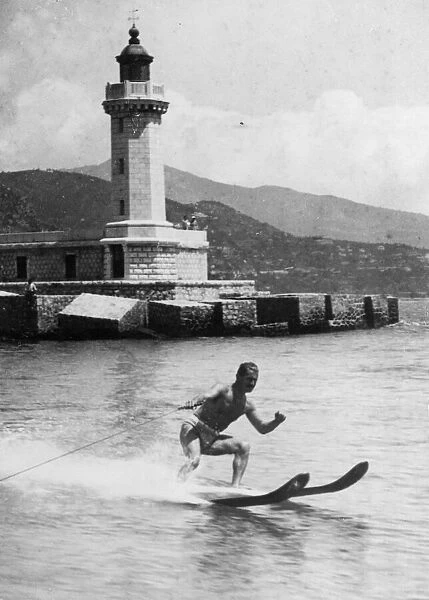 American champion water skier AZEY (?) RUTHERFORD in action! Date: 1930s