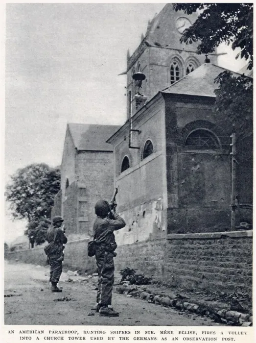 Framed Print : American paratroop, hunting snipers in St. Mere Eglise, firing a volley into a church Framed Print : American paratroop, hunting snipers in St. Mere Eglise, firing a volley into a church