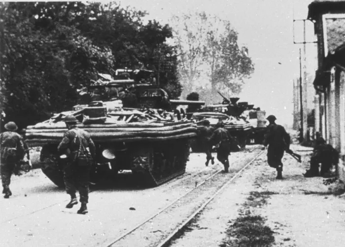 Framed Print : Amphibious tanks moving through a town, June 1944 Framed Print : Amphibious tanks moving through a town, June 1944