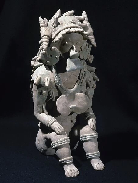 The Ancient Jama-Coaque Culture. Ecuador. Male figure sittin