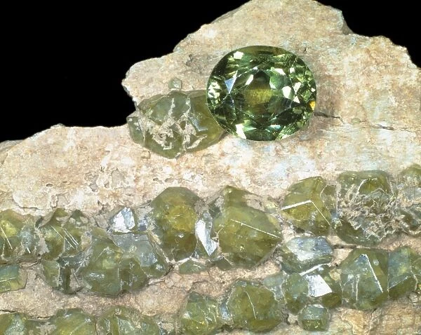 Andradite is variety dementoid, garnet and comprises of (calcium iron silicate)