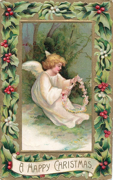Angel in the snow on a Christmas postcard