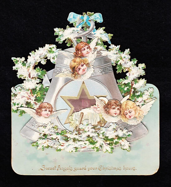 Angels and bell on a cutout Christmas card