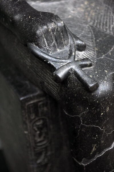 Detail of the Ankh at the statue of egyptian God Anubis