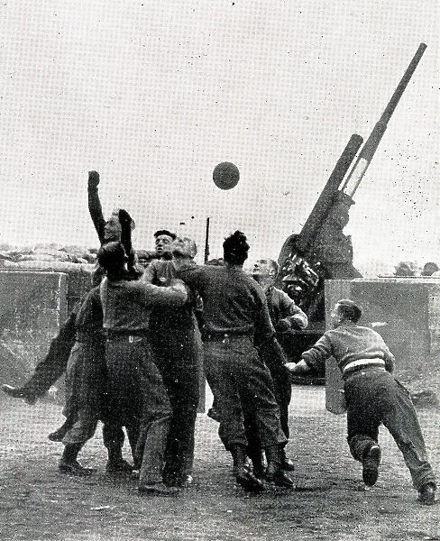 Anti-Aircraft crew members play football, WW2