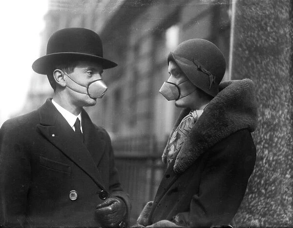 Anti-Flu Masks. A man and a woman wearing anti-flu masks