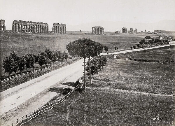 Appian Way, view of ancient Roman aquaduct, Rome Italy