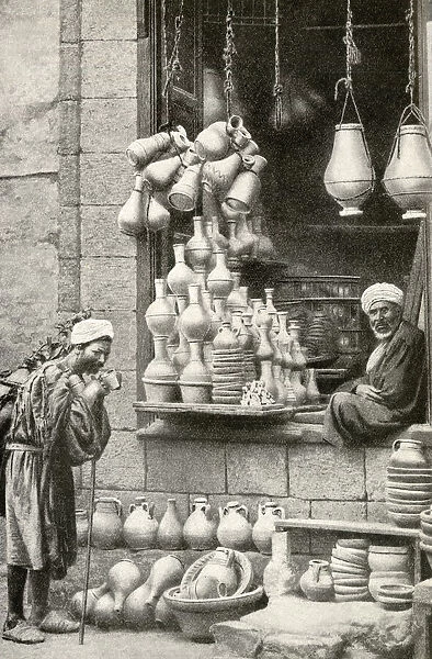 Arab pottery shop and shopkeeper, Cairo, Egypt