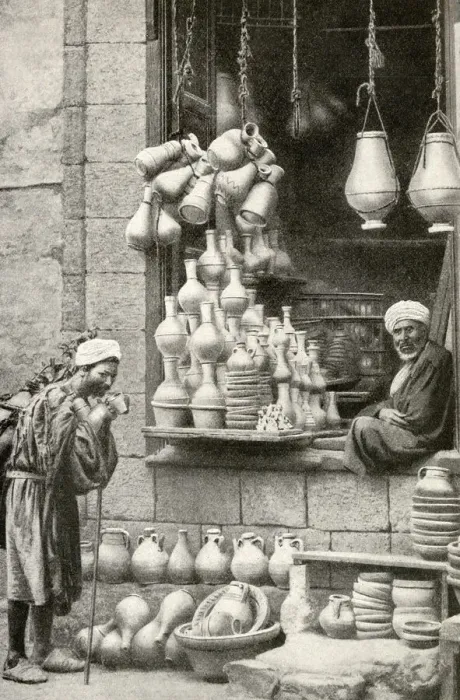 Framed Print : Arab pottery shop and shopkeeper, Cairo, Egypt Framed Print : Arab pottery shop and shopkeeper, Cairo, Egypt