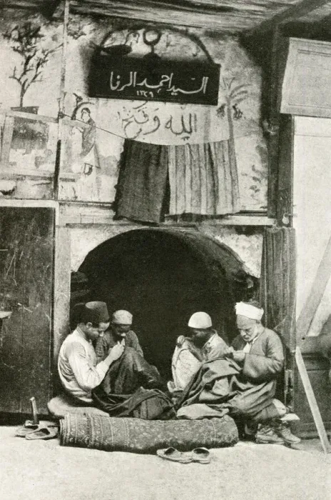 Framed Print : Arab tailor and assistants at work in a shop, Cairo, Egypt Framed Print : Arab tailor and assistants at work in a shop, Cairo, Egypt