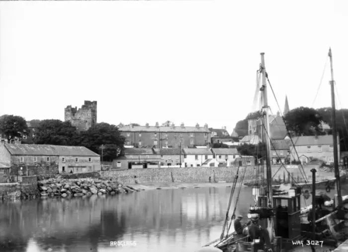 Framed Print : Ardglass - a view of Ardglass from the pier with a fishing boat in the foreground Framed Print : Ardglass - a view of Ardglass from the pier with a fishing boat in the foreground