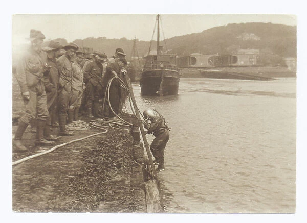 Army diver preparing to enter the water