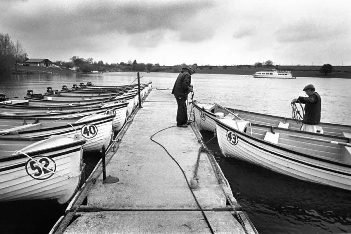 Framed Print : Attendants prepare hire boats on Rutland Water, Leics Framed Print : Attendants prepare hire boats on Rutland Water, Leics
