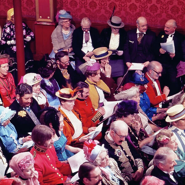 The audience of the Old Time Music Hall TV show, entitled The Good Old Days, filmed at the City Varieties in Leeds. Dressed in Victorian and Edwardian costume, they were an integral part of the show. Date: 1960s