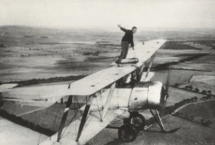 Framed Print : Avro 504K. Wing-Walking by Mr M N Hearn on an Avro 504K During a National Framed Print : Avro 504K. Wing-Walking by Mr M N Hearn on an Avro 504K During a National