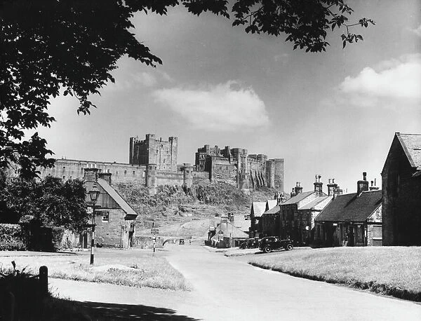 Bamburgh Castle, perched on a basalt outcrop on the edge of the North Sea at Bamburgh