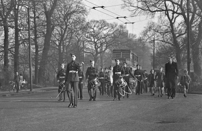 Framed Print : Band of musicians marching along a road Framed Print : Band of musicians marching along a road