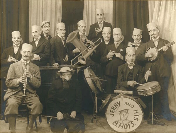 A band, most of whom are wearing disguise of heavy eyebrows and moustaches