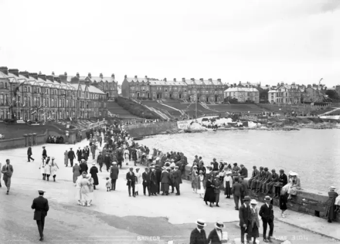 Framed Print : Bangor - a very busy view of people sitting on the sea wall towards Lenaghans Boats Framed Print : Bangor - a very busy view of people sitting on the sea wall towards Lenaghans Boats