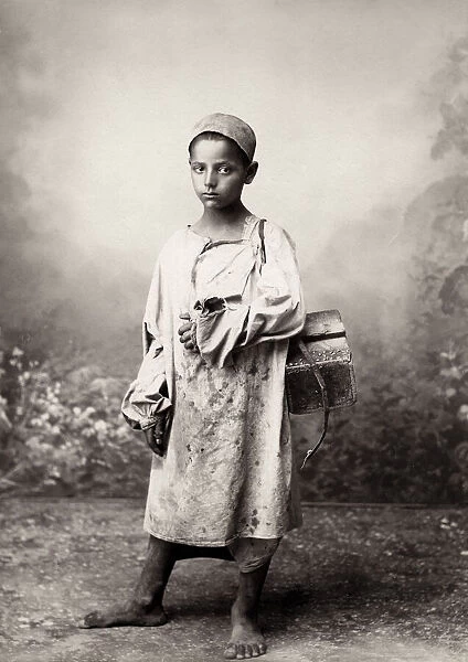 Barefoot shoeshine boy, North Africa, possibly Egypt c. 1880s