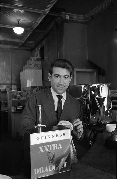 Barman in a pub, Belfast, Northern Ireland