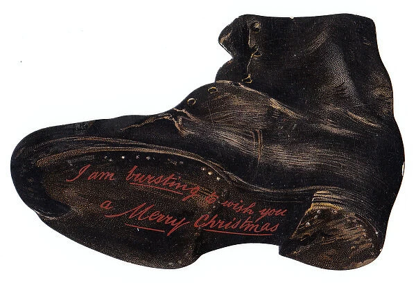 Battered old boot-shaped Christmas card