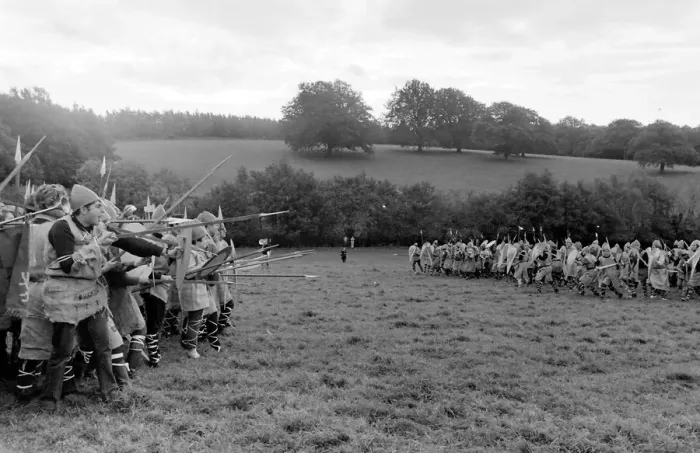 Framed Print : Battle of Hastings re-enactment. With cross-gartered jeans and dyed sackcloth doublets Framed Print : Battle of Hastings re-enactment. With cross-gartered jeans and dyed sackcloth doublets