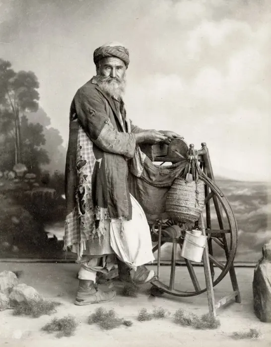 Framed Print : Bearded Egyptian man sharpening knives on grind stone Framed Print : Bearded Egyptian man sharpening knives on grind stone