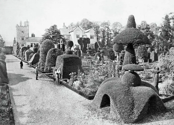 Framed Print : The beautiful gardens of Levens Hall, a manor house in the Kent valley, near the village of Levens and 5 miles south of Kendal in Cumbria. Gardeners at work clipping the impressive topiary Framed Print : The beautiful gardens of Levens Hall, a manor house in the Kent valley, near the village of Levens and 5 miles south of Kendal in Cumbria. Gardeners at work clipping the impressive topiary