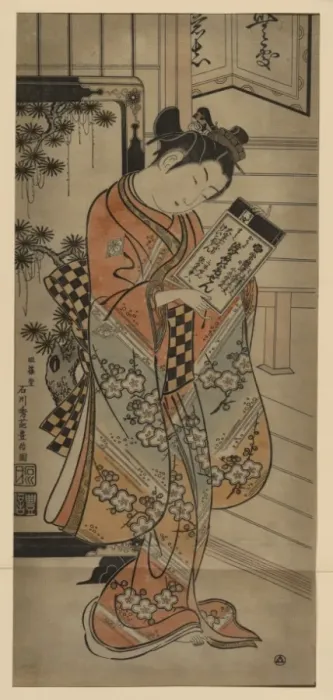 Framed Print : Beauty holding a book Framed Print : Beauty holding a book
