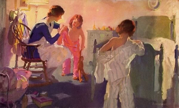 Bedtime. Young children helped into their night clothes by the nursemaid Date: 1929