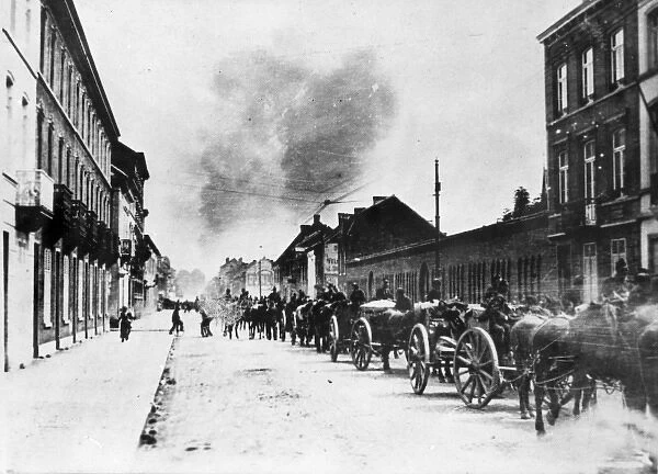 Belgian artillery leaving Tirlemont, Belgium, WW1