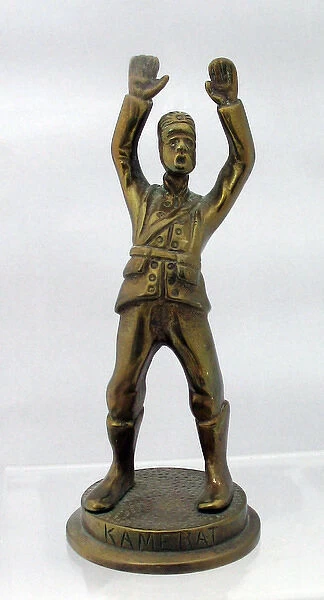 Belgian-made figure of a surrendering German soldier