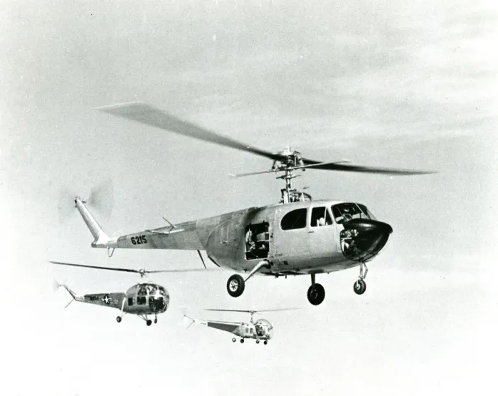 Framed Print : Bell Model 48 XR-12, 46-215, in the foreground, Bell XH-? Framed Print : Bell Model 48 XR-12, 46-215, in the foreground, Bell XH-?