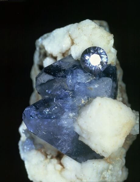 Benitoite crystal and cut stone