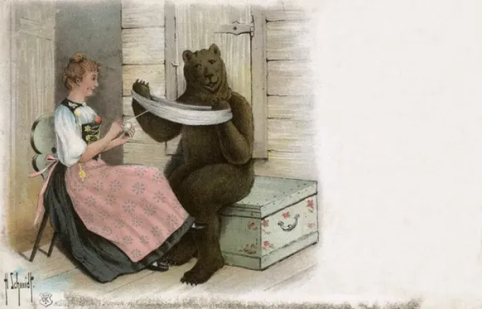 Framed Print : The Bern Bear helps a Swiss woman with her yarn winding Framed Print : The Bern Bear helps a Swiss woman with her yarn winding
